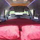 You even get cupholders back there. Cozy!